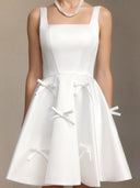 Sequoya Square-neck halter bow mini dress